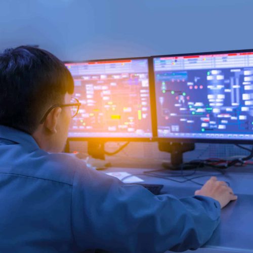 Engineering works with the tablet in the production control room
