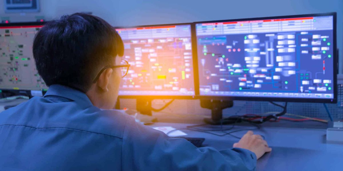 Engineering works with the tablet in the production control room